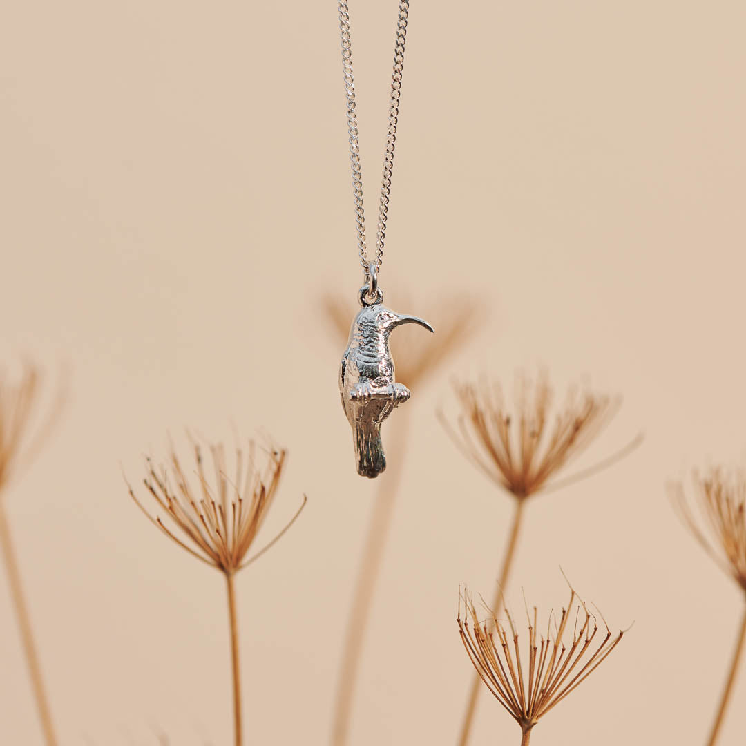 Sterling Silver hand crafted Southern Double-Collared Sunbird necklace with detailed face and wing pattern.