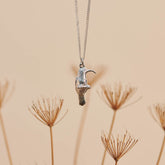 Sterling Silver hand crafted Southern Double-Collared Sunbird necklace with detailed face and wing pattern.