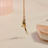 9ct Yellow Gold hand crafted Lilac-breasted Roller necklace with detailed face and wing pattern.