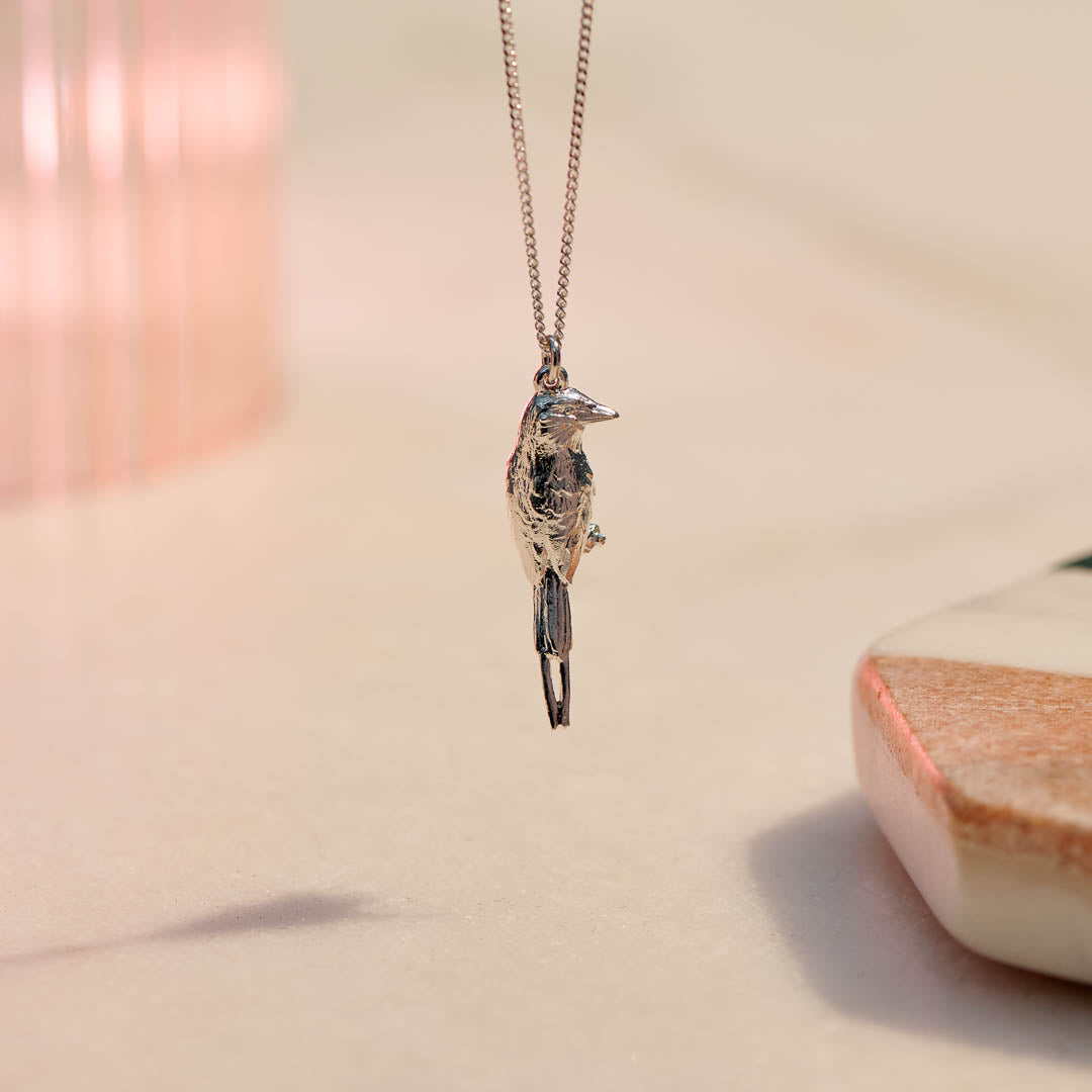 Sterling Silver hand crafted Lilac-breasted Roller necklace with detailed face and wing pattern.