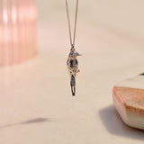 Sterling Silver hand crafted Lilac-breasted Roller necklace with detailed face and wing pattern.