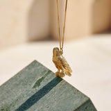 9ct Yellow Gold hand crafted African Fish Eagle necklace with detailed face and wing pattern.