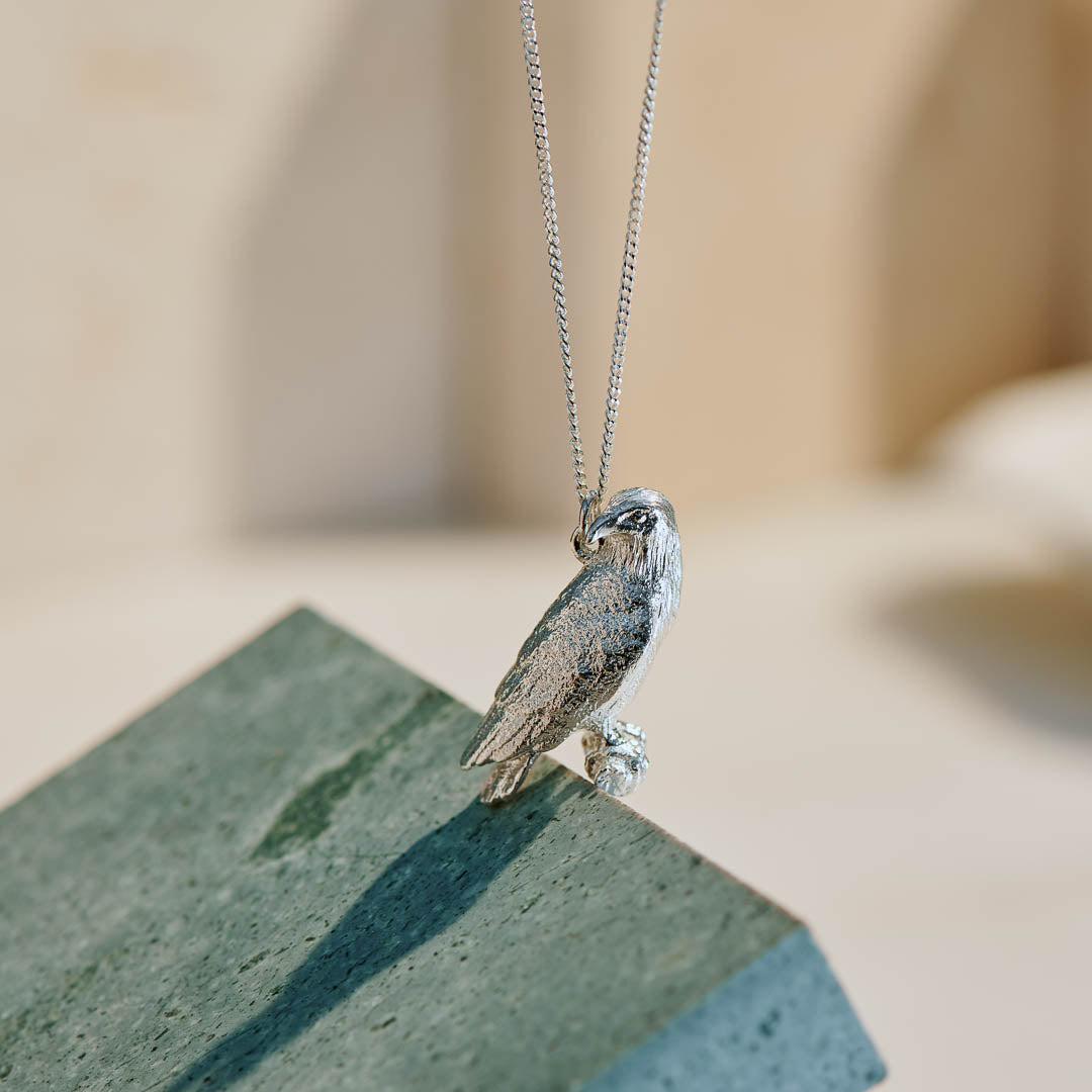 Sterling Silver hand crafted African Fish Eagle necklace with detailed face and wing pattern.