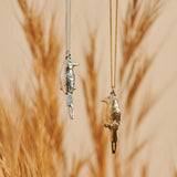 Sterling Silver and 9ct Yellow Gold hand crafted Lilac-breasted Roller necklaces with detailed face and wing pattern.