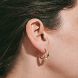 9ct yellow gold hoop earrings inspired by the shapes created by folding leaves