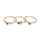 Three yellow gold stacking rings set with black diamonds
