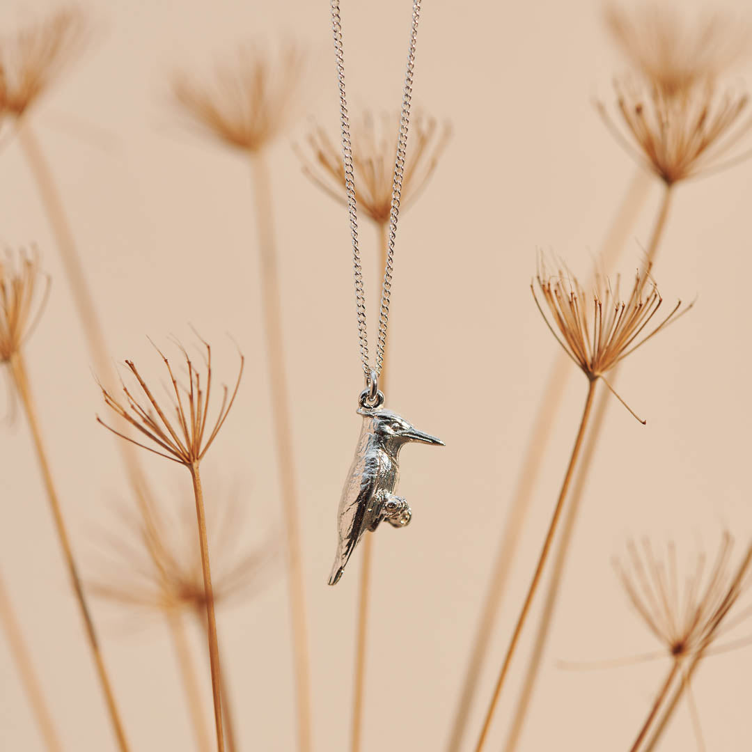 Sterling Silver hand crafted Pied Kingfisher necklace with detailed face and wing pattern.