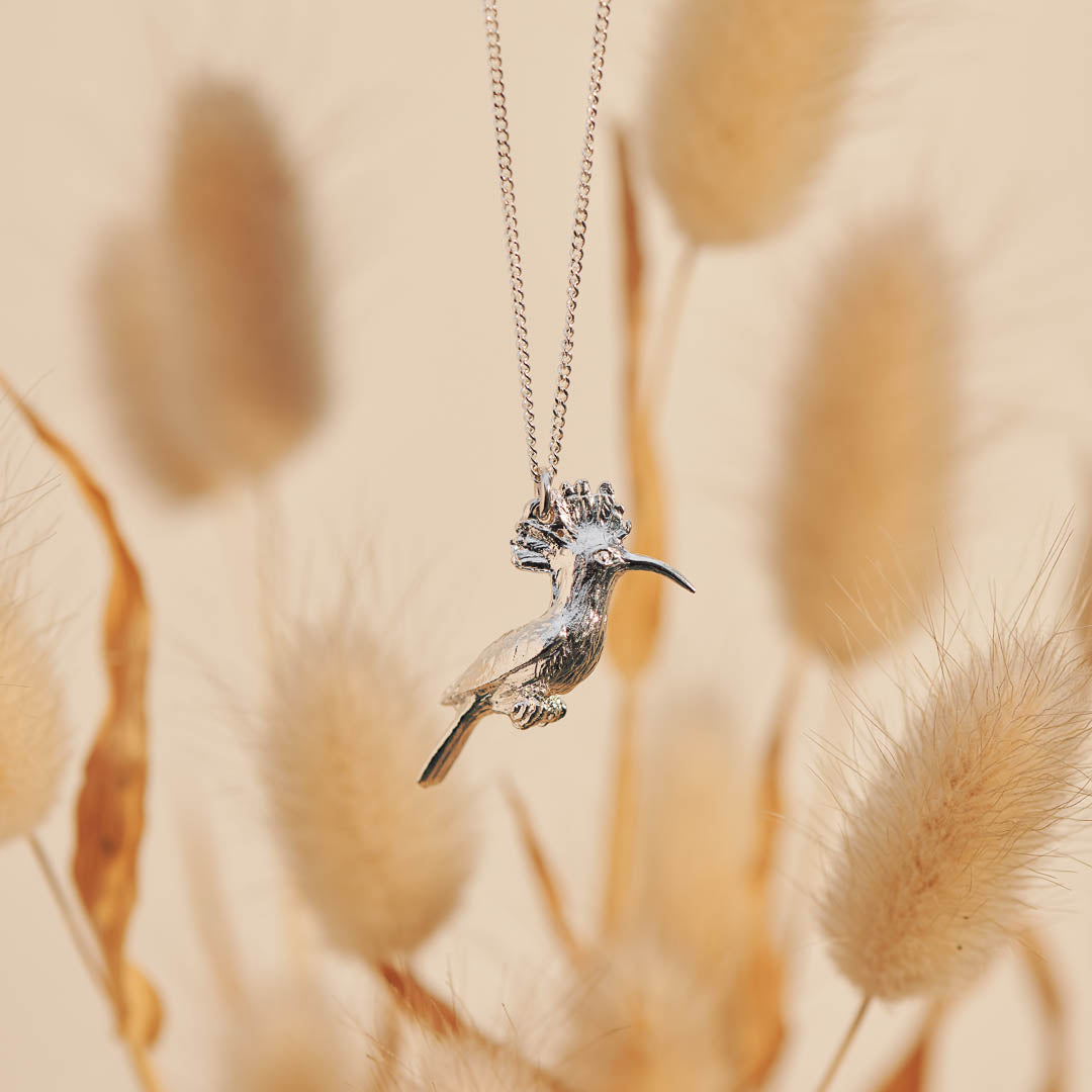 Sterling Silver hand crafted African Hoopoe necklace with detailed face and wing pattern.