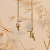 9ct Yellow Gold hand crafted Sunbird and Pied Kingfisher necklaces with detailed face and wing patterns.