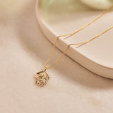 Forget-Me-Not flower inspired pendant with leaf detail, manufactured in 9ct yellow gold, and on a 9ct yellow gold rolo chain