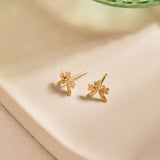 Forget-Me-Not Flower inspired studs with leaf details manufactured in 9ct yellow gold