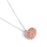Sterling silver and rose gold plated Protea Pincushion inspired pendant on a silver chain.