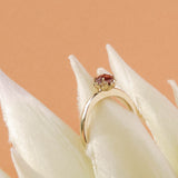 A unique red rose cut diamond set in Botanica's Protea ring manufactured in 9ct yellow gold