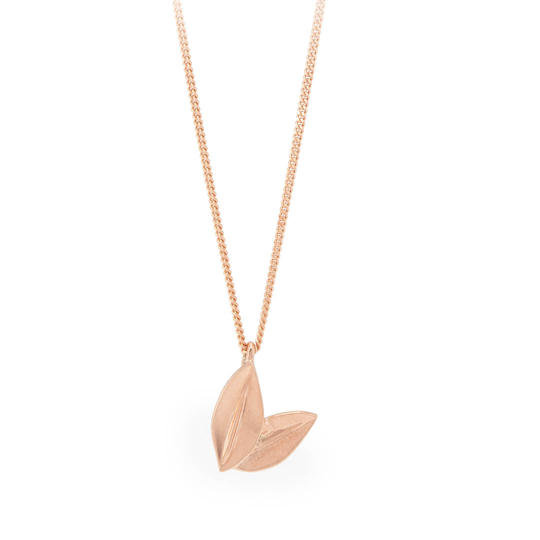Rose Gold Two Leaf Pendant on a rose gold chain botanical style jewellery