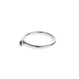 Black diamond in a classic tube setting on a sterling silver ring