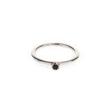 Black diamond in a classic tube setting on a sterling silver ring