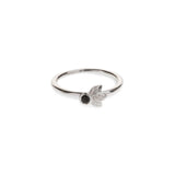 Black diamond in a classic tube setting on a sterling silver ring with three leaf details