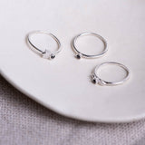 Three sterling silver stacking rings set with black diamonds
