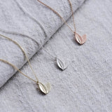 Silver, yellow gold, rose gold two leaf necklaces all together as a set